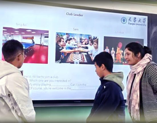 Pakistani students teaching English to children in rural schools of China
