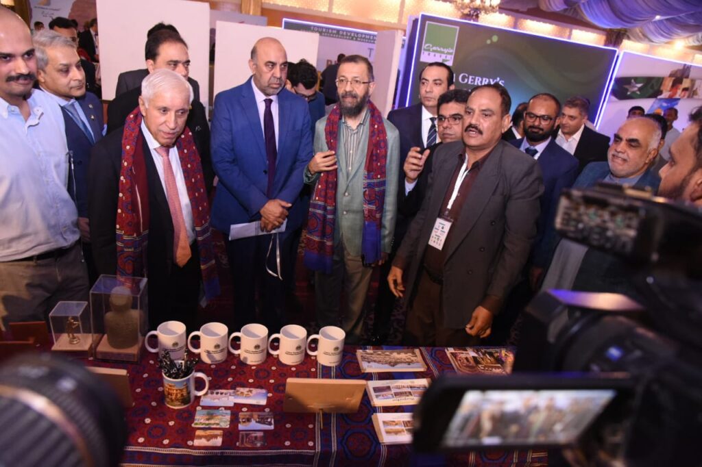 Delegates and speakers at the Sustainable Tourism Forum and Expo 2026 in Karachi discussing community development and sustainable tourism