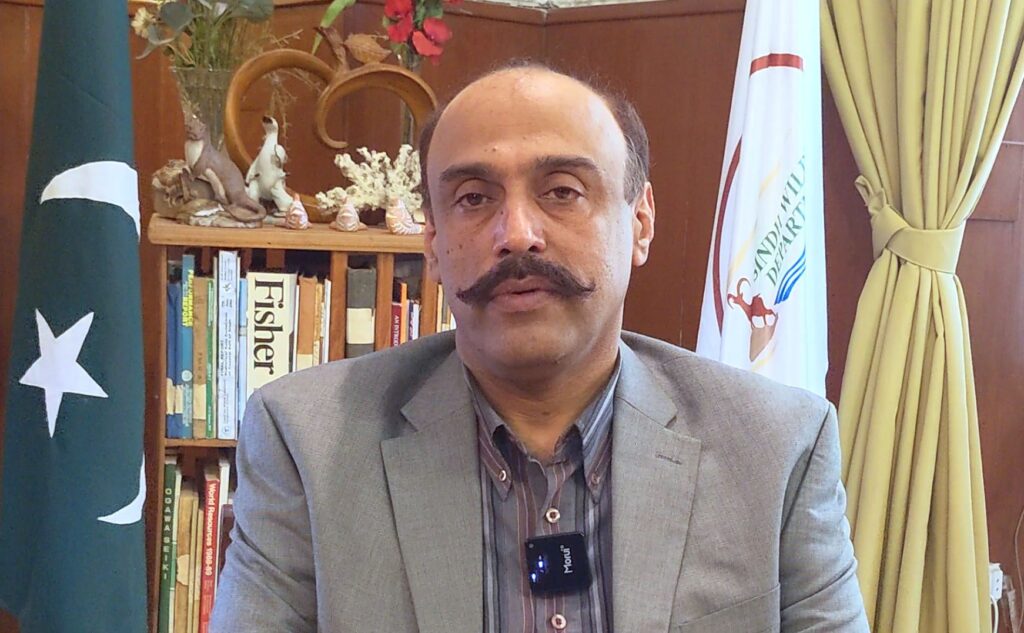Indus Dolphin surfacing in the Sindh River near Sukkur, showcasing its unique behavior and conservation importance.