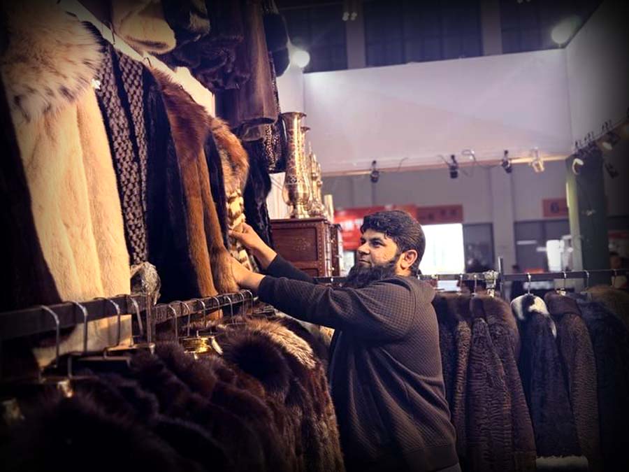 Pakistani traders showcasing leather jackets, handmade furniture and gemstones at Spring Festival Fair in Kunming, Yunnan China