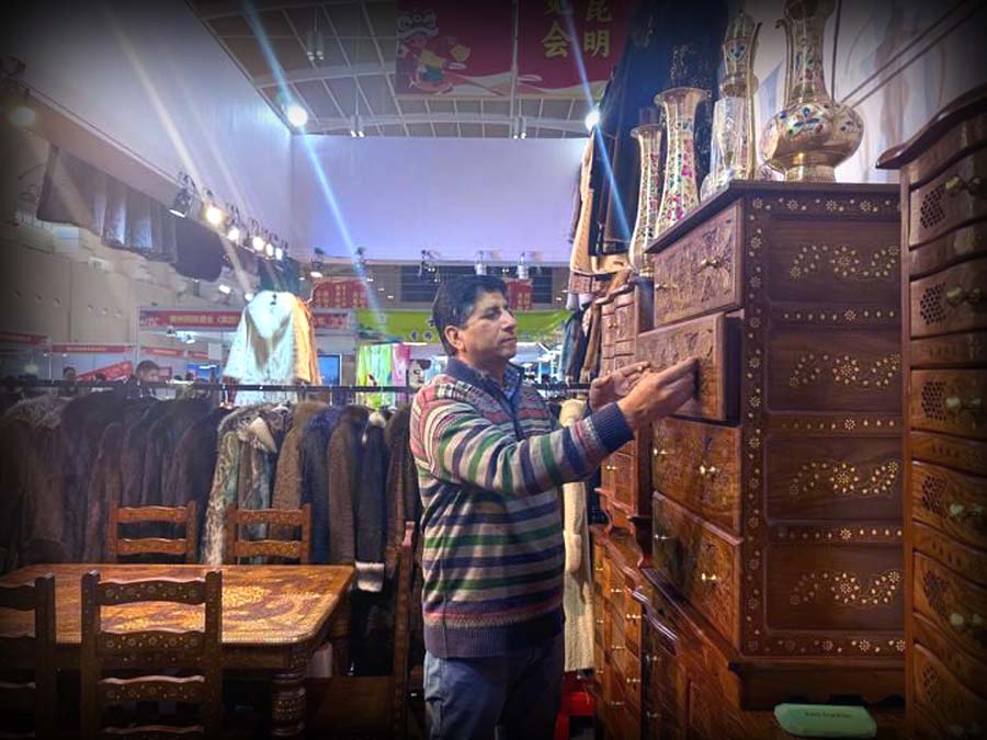 Pakistani traders showcasing leather jackets, handmade furniture and gemstones at Spring Festival Fair in Kunming, Yunnan China