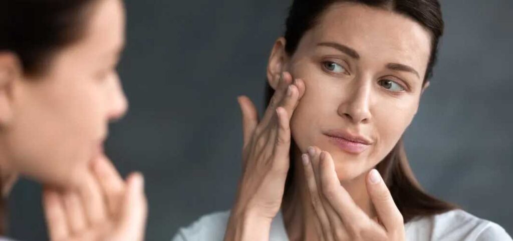 Menopause symptoms in women including hot flashes, night sweats, mood changes and skincare concerns with increasing marketing of menopause products and doctors advice for safe treatment