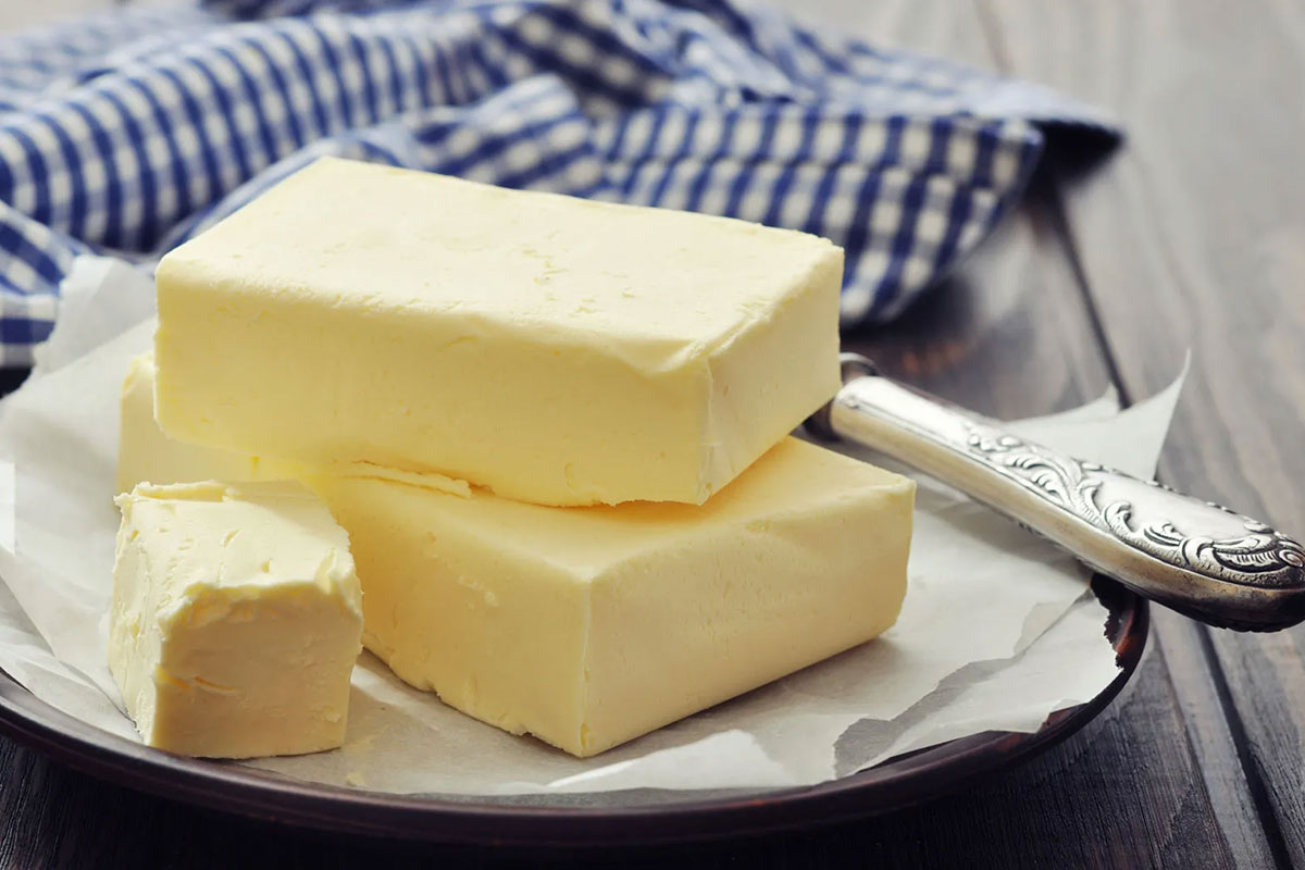 Why Does White Milk Produce Yellow Butter?